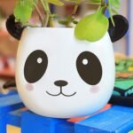 Maceta de ceramica panda feliz