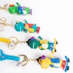 Llavero dinosaurio skate y guitarra correa de goma - Imagen 6