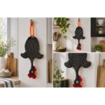 Dispenser Organizador de Bolsas Gallina Etelvina Lunares Chicos Negro y Blanco en uso en la cocina